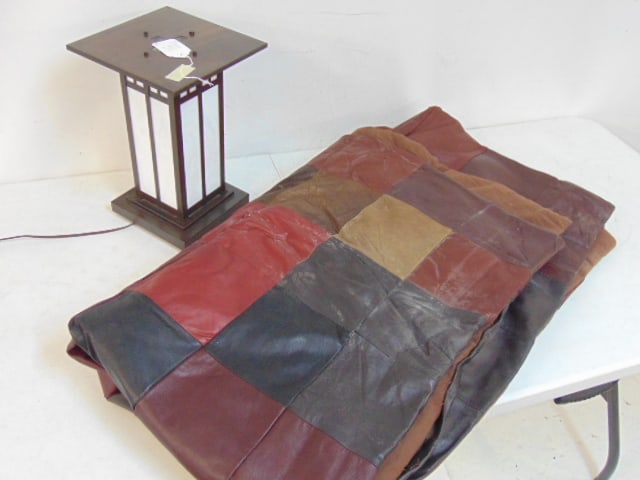 Post top style lantern fixture & leather quilt, fixture has slag glass panels and is 13.75" tall, pa: Post top style lantern fixture & leather quilt, fixture has slag glass panels and is 13.75" tall, patchwork leather "quilt" is 77" by 65", needs cleaning