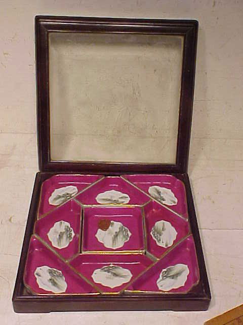 Chinese sectional tray in case, 9 pieces: Sectional tray in case, 9 pieces, wax seal, 11 3/8" square, in good condition, no breaks or chips. This item came from the estate of Mr. Kuo-ho Chang Kuo-ho Chang, was an interpreter at the United Nat