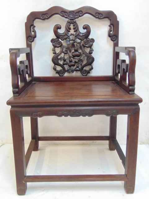 Chinese hardwood carved arm chair with carved back, various fruits, roosters (?), stretcher base, (1 of 5)