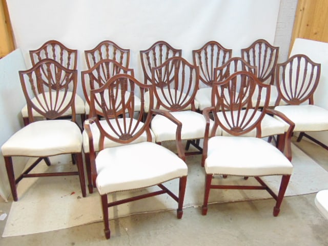 Assembled set of 12 mahogany shield back chairs, contains two sets of 6, set with the two arm chairs (1 of 12)