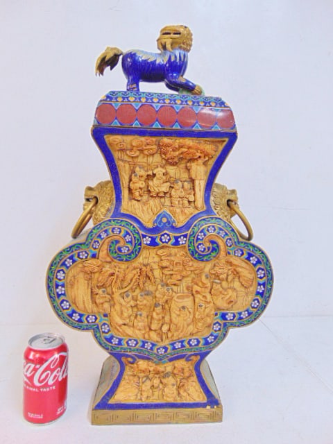 Decorative Chinese Cloisonne vessel with lid, has carved inset panels, foo dog finial, 23.5" tall,: Decorative Chinese Cloisonne vessel with lid, has carved inset panels, foo dog finial, 23.5" tall, 13" wide, 6" deep