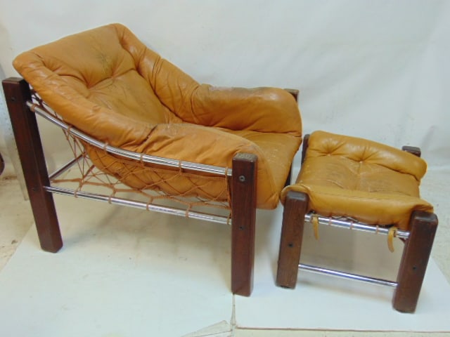 Jean Gillon for Italma "Amazonas" lounge chair & ottoman, Brazilian hardwood legs with steel rods &: Jean Gillon for Italma "Amazonas" lounge chair & ottoman, Brazilian hardwood legs with steel rods & nylon netting, tufted leather seat is as is, worn, chair is 35.75" deep, 31" wide, rear leg is 29" t