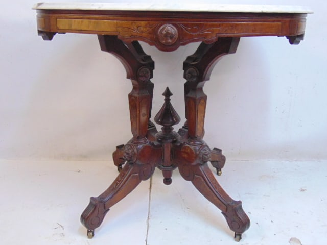 Oval Victorian marble top table, white marble, top is 36.75" by 28", height is 29.5", missing one: Oval Victorian marble top table, white marble, top is 36.75" by 28", height is 29.5", missing one piece of decorative trim