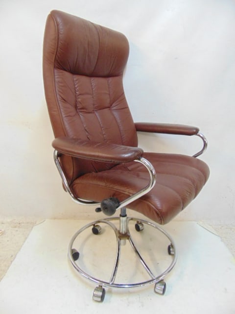 Mid Century reclining swivel office chair in brown vinyl on chrome base, chair is 29.25" wide, 23" (1 of 4)