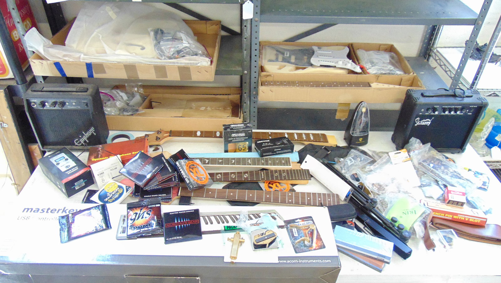 Large lot of guitar parts & accessories, including two amps, Masterkey 61 USB Controller Keyboard: Large lot of guitar parts & accessories, including two amps, Masterkey 61 USB Controller Keyboard (still in box), various guitar body parts, necks, sound boards, strings, guitar kits, mini 2 Beatbuddy