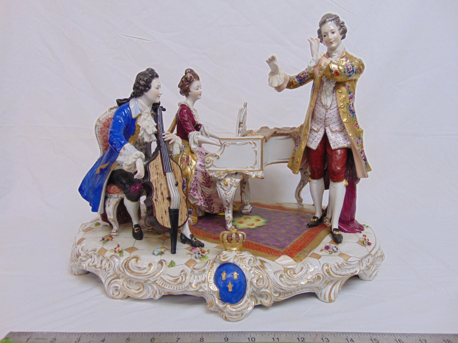 Large porcelain musician group, lady behind piano, seated man with cello (no bow) & standing man (1 of 10)