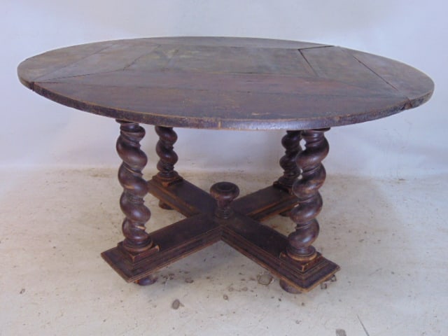 Antique Flemish table with drop leaf sides on spiral leg base, table can convert from round to: Antique Flemish table with drop leaf sides on spiral leg base, table can convert from round to square, set up round top diameter is 49.25", square size is 35" by 35", table has sliding brackets that h