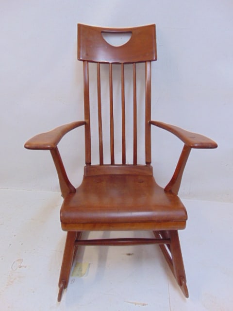 Colonial American revival high back rocking chair, probably Sikes Co, fragment of label on bottom: Colonial American revival high back rocking chair, probably Sikes Co, fragment of label on bottom seat, chair is 25.25" wide, 18.5" deep (seat), height is 41"