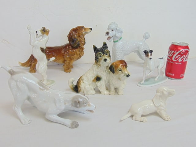 7 porcelain dog figurines, Cocker Spaniel, by Karl Ens 11" long (has small chip on ear), white (1 of 17)
