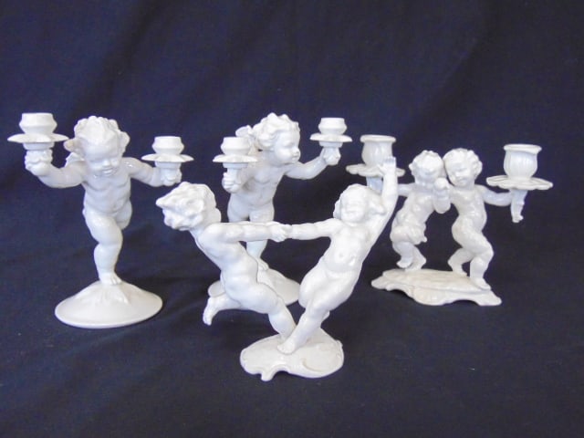 4 Hutschenreuther white porcelain figurines, 3 candelabra one with dancing putt. (1 of 8)