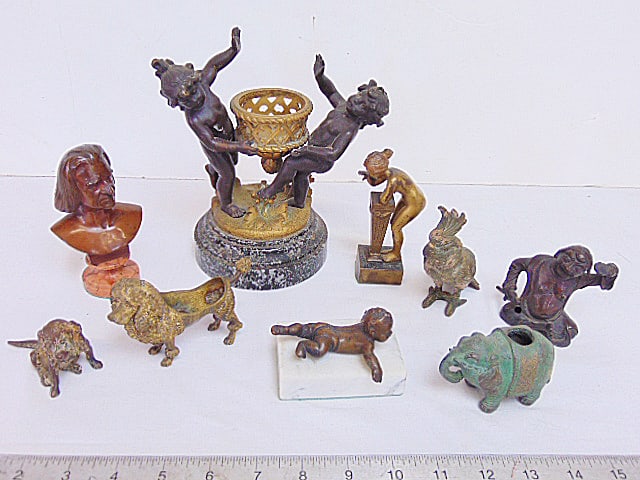 9 small bronzes, 2 putty around a basket on marble base, signed E. Provost, height 7", cold painted (1 of 12)