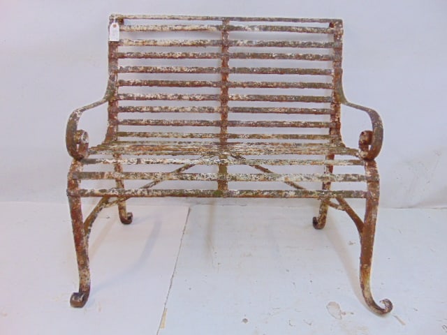 Iron garden bench, in old chipped paint, bench is 33.75" wide, 22" deep, 32.5" height, right front (1 of 4)