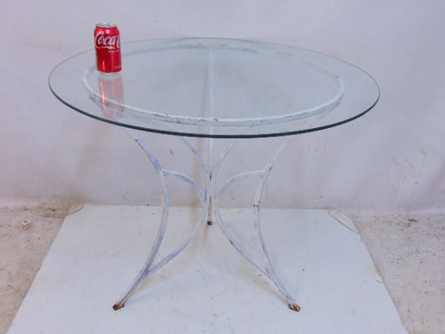 Glass top iron base patio table, base painted white, top is 35" in diameter, height is 28.75" (1 of 4)