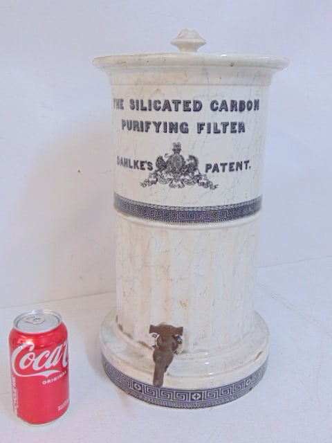 Vintage ceramic Dahlke's Patent Silicated Carbon purifying filter, faux marble, lid cracked, chip: Vintage ceramic Dahlke's Patent Silicated Carbon purifying filter, faux marble, lid cracked, chip inside bottom rim, height is 17.5"