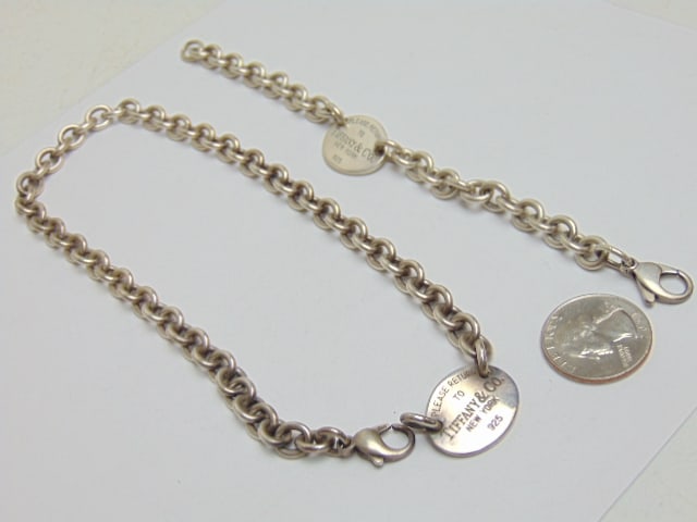 Jewelry. Sterling Tiffany & Co. necklace & bracelet, 2.42 troy oz total weight, 7 1/2" length: Jewelry. Sterling Tiffany & Co. necklace & bracelet, 2.42 troy oz total weight, 7 1/2" length bracelet & 15" length necklace, both marked Please return to Tiffany & co New York 925,