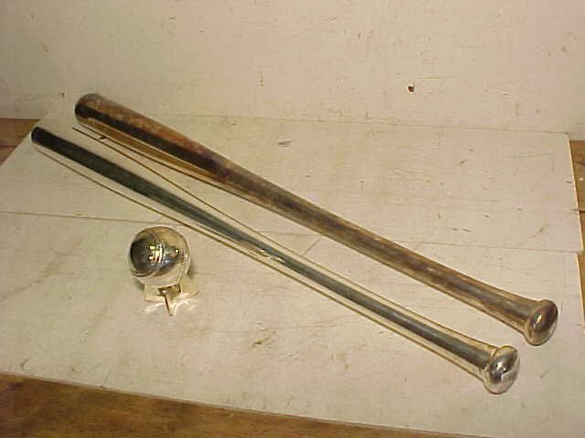 2 silver ('800 ?) baseball bats & ball, marked Italy: 2 silver ('800 ?) baseball bats & ball, marked Italy, the ball is clearly marked '800 (see images), the bats show a faint mark on the grip end, but mark was not clear enough to read.