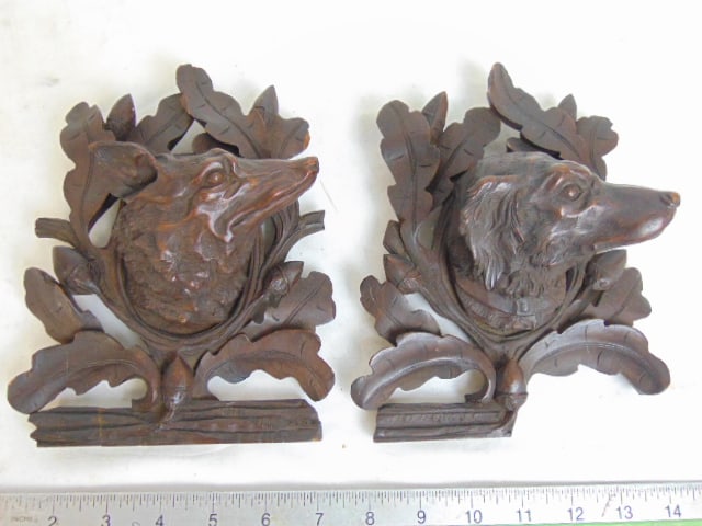 2 Black Forest bookend carvings, dog & wolf, front of bookends only, dog missing part of bottom, (1 of 4)