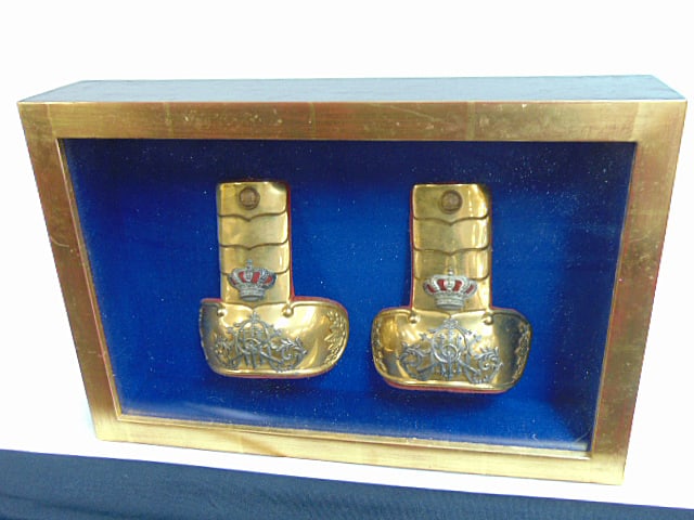 Pair Spanish military epaulettes, brass with silver detail and the royal crown, in shadowbox frame, (1 of 4)