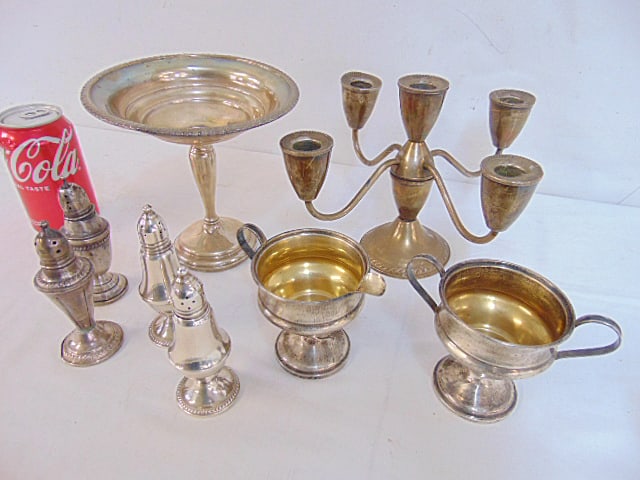 Lot weighted sterling, candle holders, tazza (broken), salt & peppers, sugar & creamer (1 of 3)
