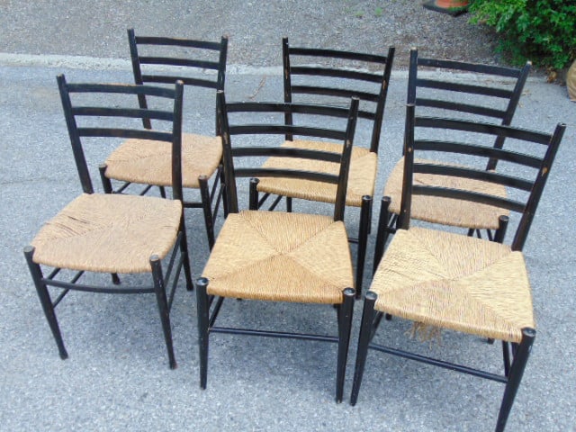 6 Gio Ponti chairs, black with rush seats, 2 sets of 3, Italian & Spanish made, set of three with: 6 Gio Ponti chairs, black with rush seats, 2 sets of 3, Italian & Spanish made, set of three with the triple horizontal back supports have loose frames, some wear on paint