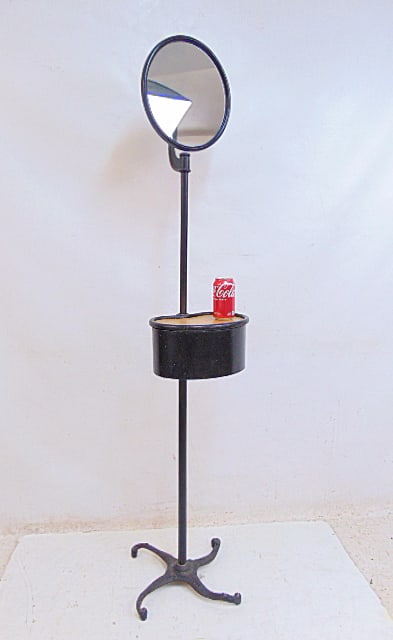 Standing shaving stand, wrought iron base, with storage compartment adjustable in height, stand is: Standing shaving stand, wrought iron base, with storage compartment adjustable in height, stand is 66.75" tall