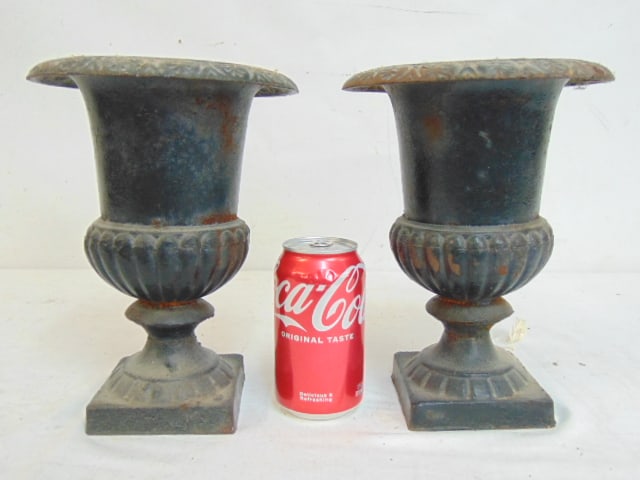 Pair small cast iron urns in classical form, urns are 9.25" tall, 7" wide. (1 of 4)