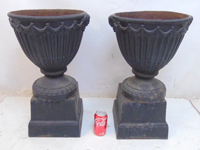 Pair of cast iron garden urns on bases, plinths, bases not original to tops, urns are 22,75" tall (1 of 4)