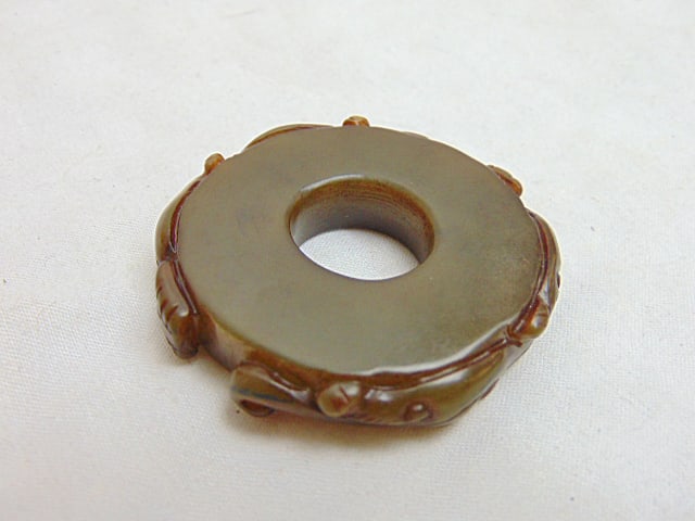 Jade bi disc in brown, diameter is 2" (1 of 5)