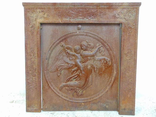 Cast iron fireplace front, with relief decoration, angel & putti, door is 25.5" by 22", surround (1 of 5)