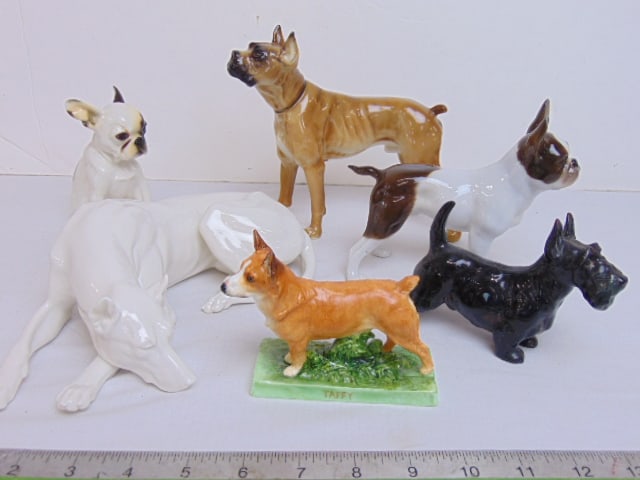 6 porcelain dog figurines, early Hutschenreuther bulldog, white porcelain greyhound (Nymphenburg ?),: 6 porcelain dog figurines, early Hutschenreuther bulldog, white porcelain greyhound (Nymphenburg ?), Royal Worcester Corgi "Modelled by Miss A. Ellis, Royal Doulton Scottish Terrier, more, all in good