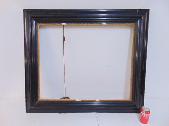 Ebonized frame, gilt gesso trim, frame is 33.5" by 39", opening is 25" by 30", some chips, also loss (1 of 5)