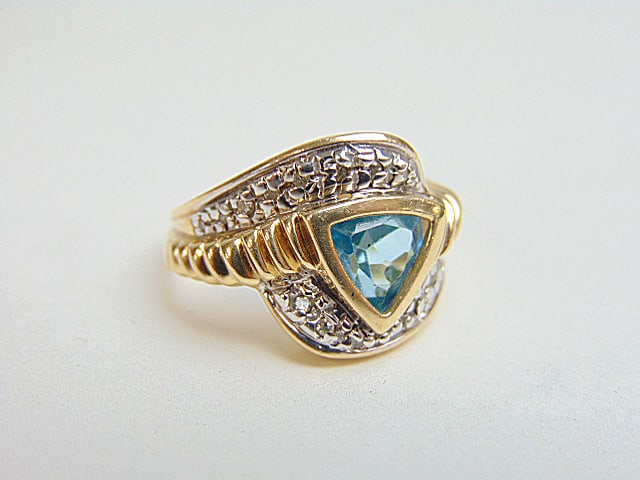 Jewelry. 14k GOLD ring, 14k w/ triangular blue gemstone & diamond chips, size 7 1/2, 6.40 grams,: Jewelry. 14k GOLD ring, 14k w/ triangular blue gemstone & diamond chips, size 7 1/2, 6.40 grams, hallmark RS 14k, one black speck in the stone