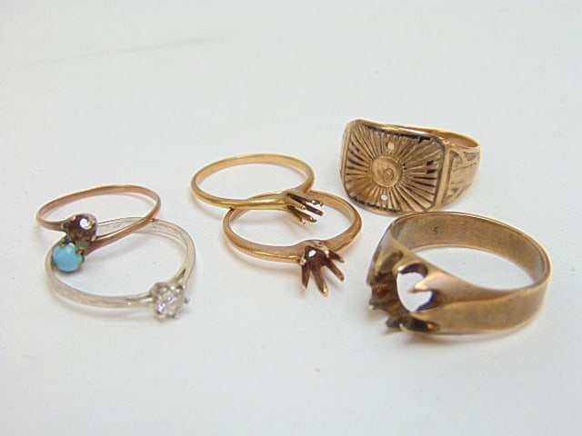 Jewelry. GOLD collection of rings including 2 14k rings no stones 3.25 grams for both; 10k w design (1 of 3)