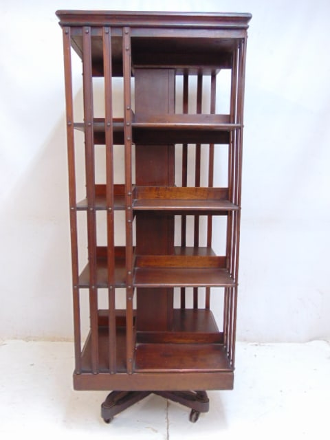 Revolving bookcase, 4 shelves, bookcase is 57.5" tall, deep, 23.25" and 23.25" wide. (1 of 6)