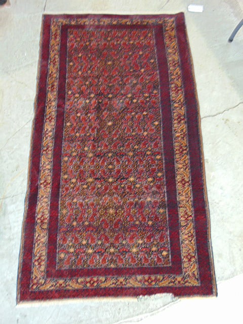 Persian scatter rug, Hossainabad (?) pattern, in deep red, carpet is 78" by 43.5", has loss on one (1 of 5)