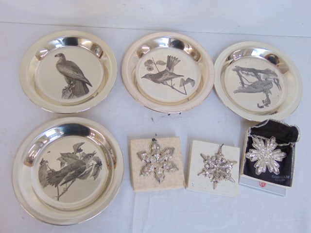 Set 4 sterling silver plates with bird decorations issued by the Audubon Society, 8" each, plus 4: Set 4 sterling silver plates with bird decorations issued by the Audubon Society, 8" each, plus 4 Gorham sterling snowflake Christmas ornaments, 26 troy,