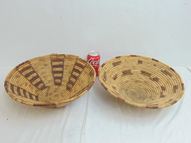 2 cone form coil baskets with decorations, each basket is 14.25" wide, height is 5.5", one has loss: 2 cone form coil baskets with decorations, each basket is 14.25" wide, height is 5.5", one has loss at edge