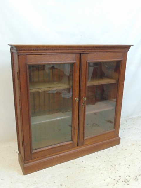 Two door oak cabinet with oak shelves, glass doors, cabinet is 39" wide, 10" deep, height is 38" (1 of 4)