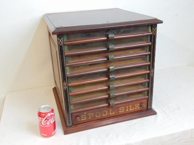Spool cabinet, silk, M. Heminway & Sons, Sublime Quality Spool Silk, 8 glass front drawers plus wood: Spool cabinet, silk, M. Heminway & Sons, Sublime Quality Spool Silk, 8 glass front drawers plus wood bottom drawer with original lettering, plus lettering on (raised panel) sides, cabinet is 16.75" wi