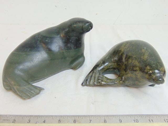 2 carved Inuit stone seals, small stone seal is 6.25" wide, 6.5" deep, large seal is signed and (1 of 9)