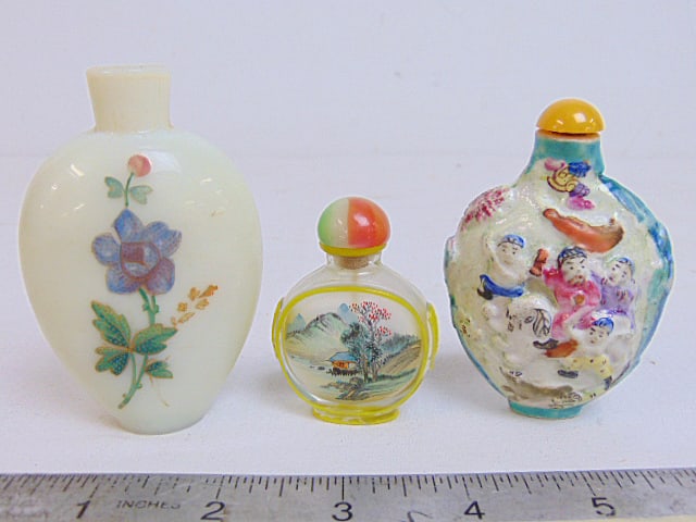 3 Chinese snuff bottles, 2 glass, one porcelain bottle is signed, large snuff is missing lid and is (1 of 7)