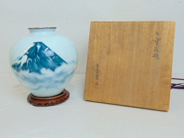 Large Japanese porcelain vase in wood box, vase decorated with Mount Fuji scene, has silver bottom & (1 of 8)
