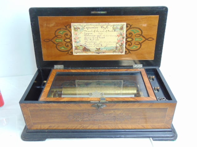 Ami Rivenc Swiss cylinder music box, plays 8 tunes, in inlaid rosewood case with floral decoration, (1 of 9)