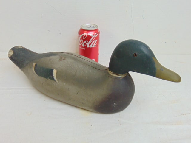 Carved wood duck decoy, painted with glass eyes, 17" long, 5.5" wide. (1 of 4)