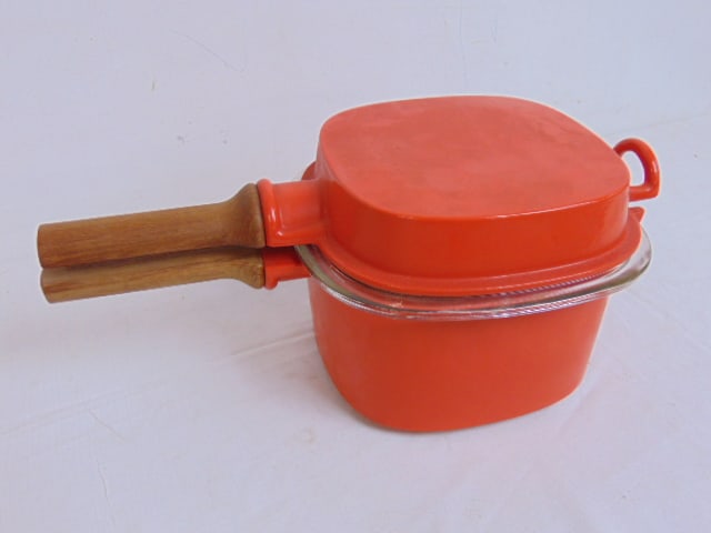 Vintage Dansk IHQ Orecast Cast iron casserole with red enamel finish and glass insert by Jens: Vintage Dansk IHQ Orecast Cast iron casserole with red enamel finish and glass insert by Jens Quistgaard, with wood handle, 14.5" deep, 8" wide, height is 6"
