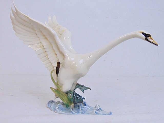 Hutschenreuther porcelain swan figurine, by Hans Achtziger, with original paper label, 11.25" long,: Hutschenreuther porcelain swan figurine, by Hans Achtziger, with original paper label, 11.25" long, 8 5/8" tall, in good condition
