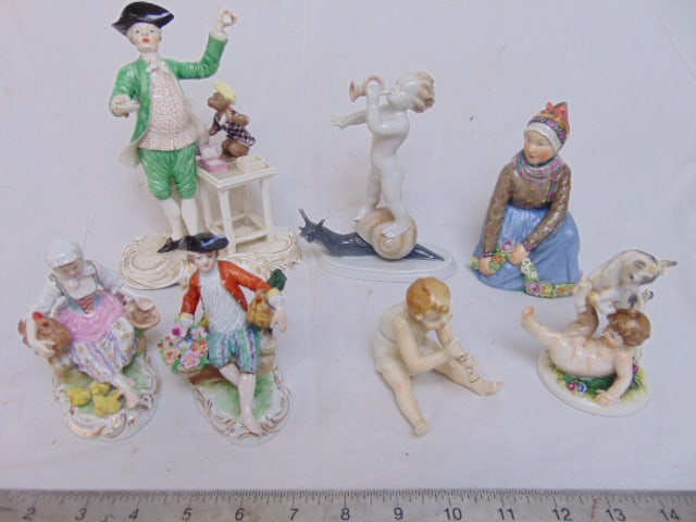 7 porcelain figurines, including Nymphenburg "Quacksalber", height is 7 7/8"; pair Carl Thieme (1 of 19)