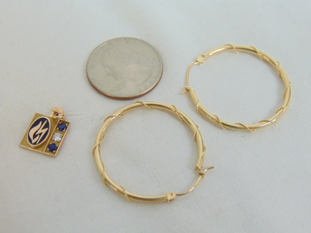 Jewelry. 2 pc 10kt gold, hoop earrings 1.70 grams, hallmark 10k on post, small charm w/ diamond (1 of 4)