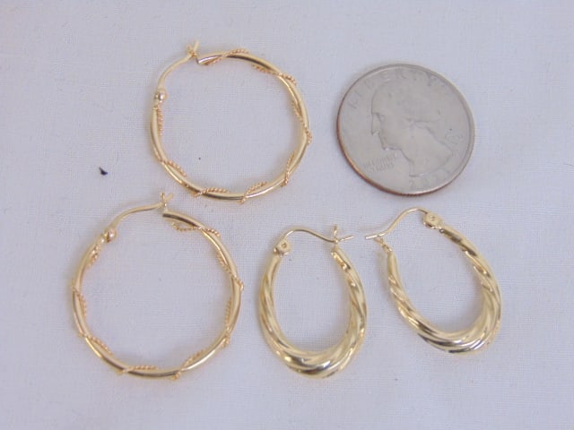 Jewelry. 2 pairs of 14kt gold hoop earrings, round earrings 2 grams & oval hoop earrings 1.55 grams, (1 of 3)
