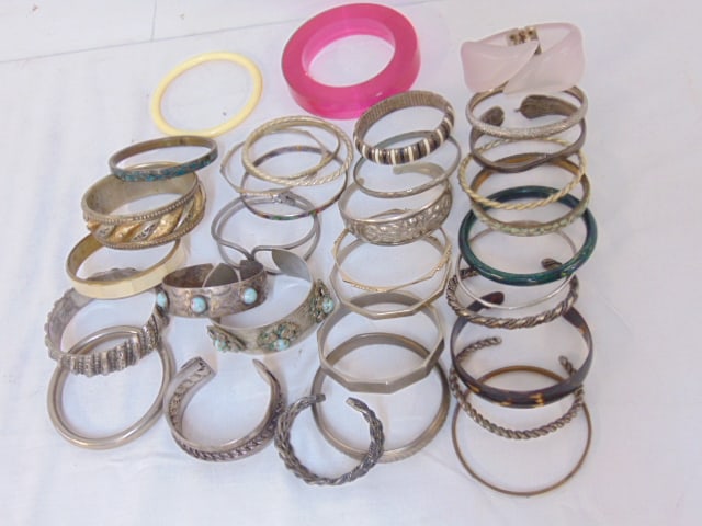 Jewelry. 34 Vintage bracelets/bangles, some sterling, silver tone, tribal, costume & other (1 of 5)